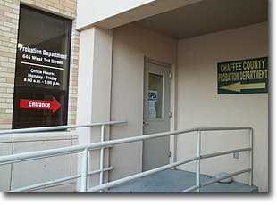 Building entrance with a ramp and a Chaffee County Probation Department sign
